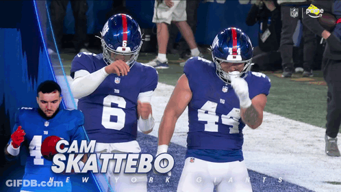 Two Giants Football Players Standing GIF