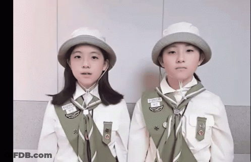 Two Girl Scouts One With Supreme Name Tag GIF