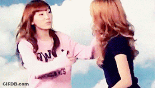 Two Girls Are Hugging Each Other And One Has A Shirt That Says ' Always ' On It GIF