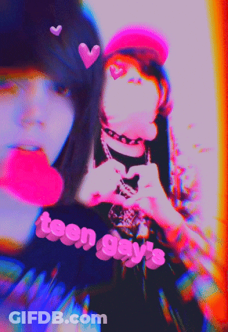 Two Girls Are Making A Heart Shape With Their Hands And The Words Teen Gay 'S On The Bottom GIF