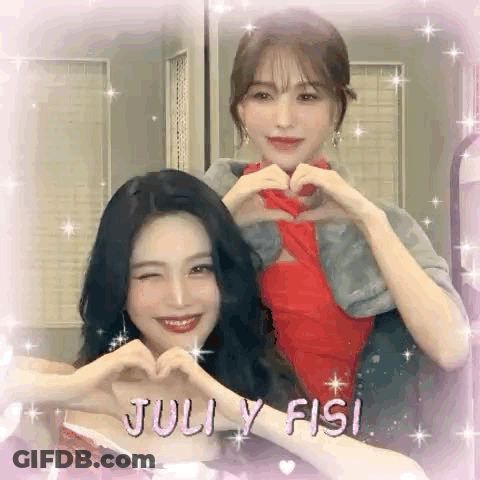 Two Girls Are Making A Heart With Their Hands . GIF