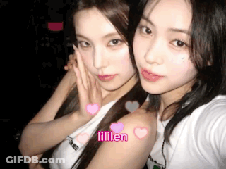 Two Girls Are Posing For A Picture And One Of Them Has The Name Lillen On Her Arm GIF