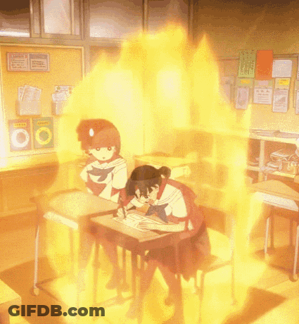 Two Girls Are Sitting At Desks In A Classroom With A Bulletin Board That Says ' Chinese ' On It GIF