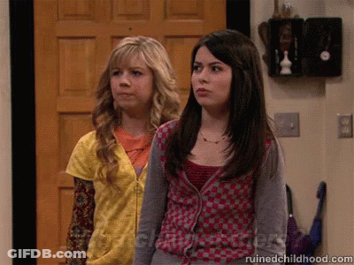 Two Girls Are Standing In Front Of A Door And The Website Ruinedchildhood.com Is Visible GIF