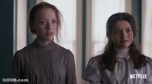 Two Girls Are Standing Next To Each Other With Netflix Written On The Bottom GIF