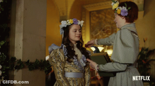 Two Girls Are Standing Next To Each Other With Netflix Written On The Bottom Of The Image GIF