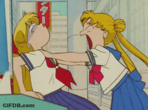 Two Girls Fighting In Front Of Sign GIF