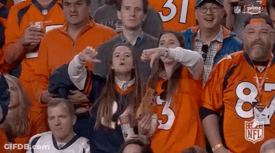 Two Girls Giving Booo To The Crowd GIF