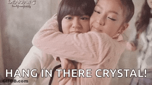 Two Girls Hugging With Hang In There Crystal GIF