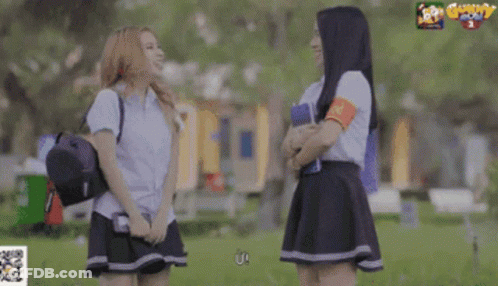 Two Girls In A Park With QR Code GIF