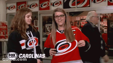 Two Girls In Carolina Hurricanes Jersey GIF