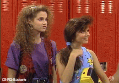 Two Girls In Front Of Red Lockers GIF