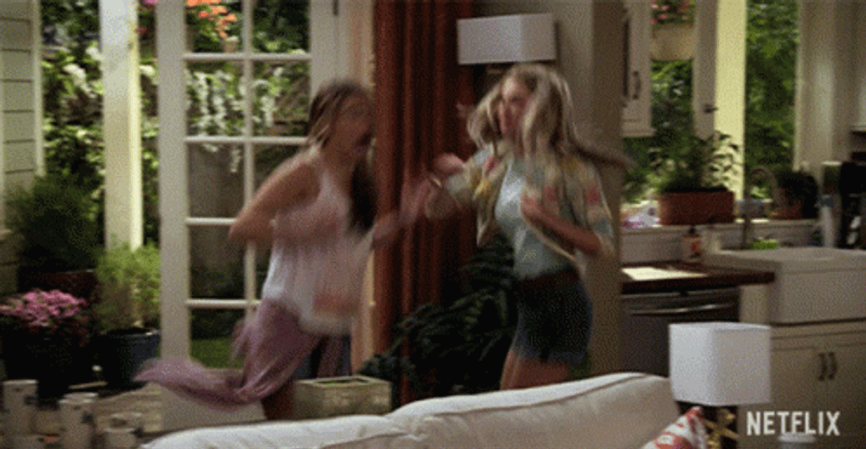 Two Girls Jumping Up And Down GIF