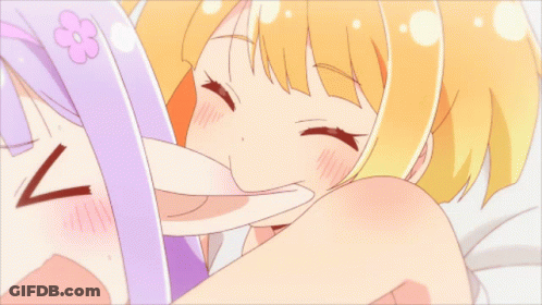 Two Girls Laying On Bed GIF
