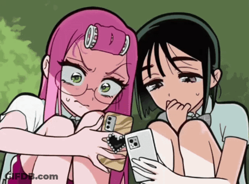 Two Girls Looking At A Phone GIF