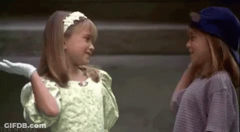 Two Girls Looking At Each Other GIF