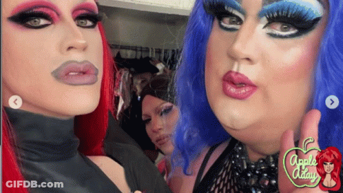 Two Girls Looking At Each Other One Holding Key GIF