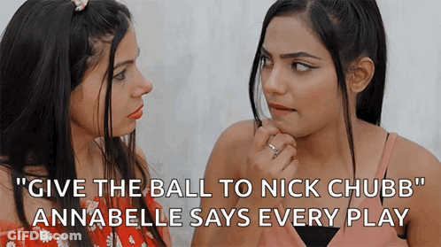 Two Girls Looking At Each Other Saying Give The Ball To Nick Chubb Annabelle GIF