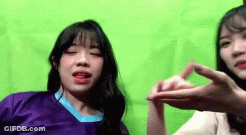 Two Girls Making Heart Shape GIF