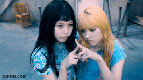 Two Girls Making Heart Shape, One Ring GIF