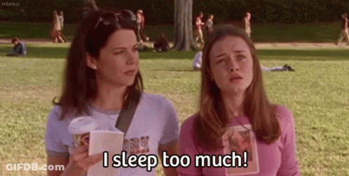 Two Girls One With Coffee One With Book GIF