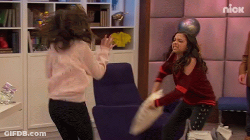 Two Girls Pillow Fight GIF