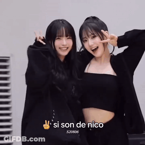 Two Girls Posing With Si Son De Nico GIF