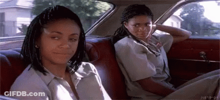 Two Girls Sitting In Back Seat Of Car GIF