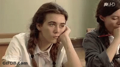 Two Girls Sitting In Classroom GIF