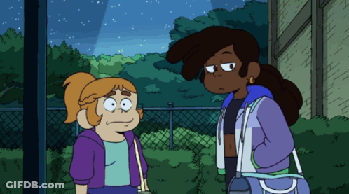 Two Girls Standing Together, One In Purple Jacket GIF