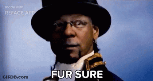 Two Girls Standing With Fur Sure In Rainbow Colors GIF