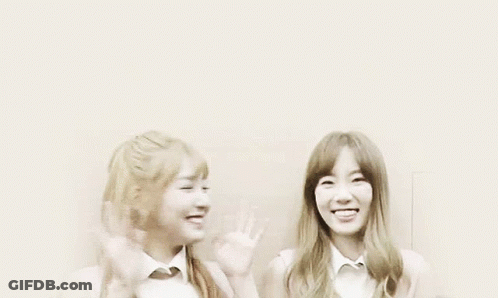 Two Girls Waving Hands GIF