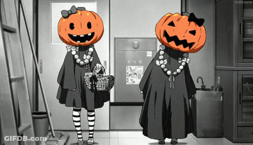 Two Girls With Pumpkins On Their Heads Are Standing In A Hallway GIF