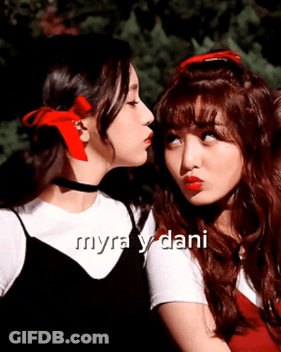 Two Girls With Red Ribbons Kissing With Myra Y Dani GIF