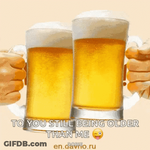 Two Glasses Of Beer Are Being Held Up In Front Of A Sign That Says Happy Birthday Beer To You Still Being Older Than Me GIF