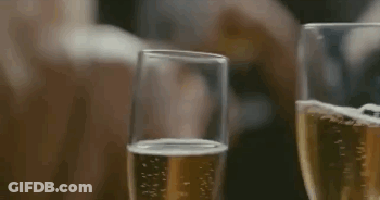 Two Glasses Of Champagne Being Poured GIF