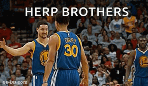 Two Golden State Warriors Basketball Players Are Standing Next To Each Other On The Court . GIF