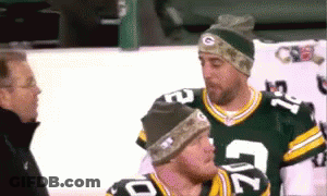 Two Green Bay Packers Players Talking To Man GIF