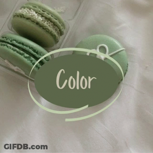 Two Green Macarons In A Plastic Container With A Green Circle That Says Color GIF