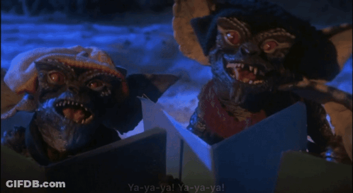 Two Gremlins Singing Ya-Ya-Ya In Dark Room GIF
