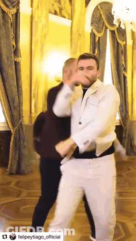 Two Guys Dancing Bachata Styling GIF