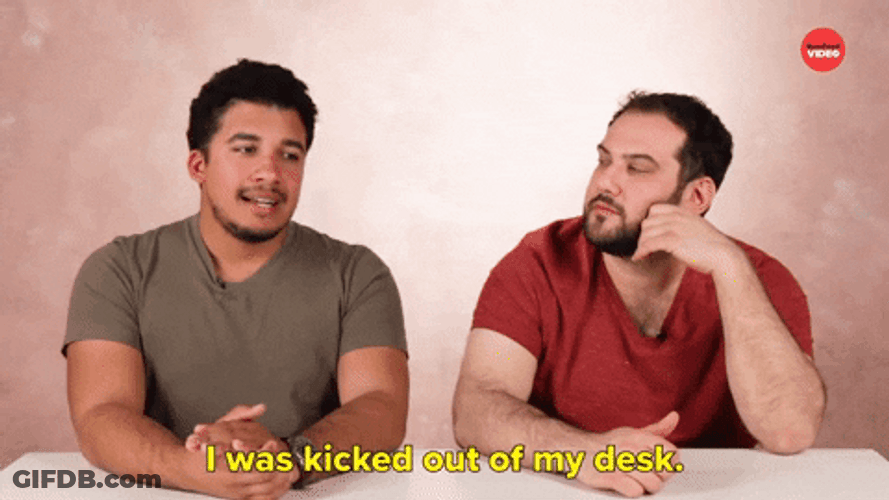 Two Guys Kicked Out Of Desk GIF