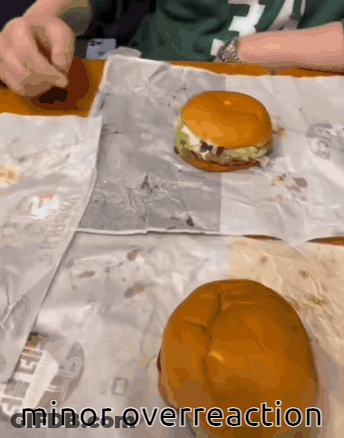 Two Hamburgers On A Table With The Words Minor Overreaction GIF