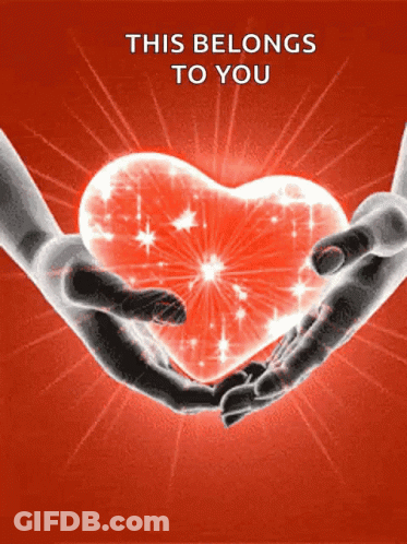 Two Hands Holding A Heart With The Words This Belongs To You GIF