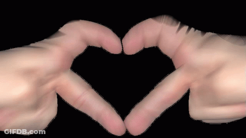 Two Hands Make A Heart Shape With Their Fingers On A Black Background GIF