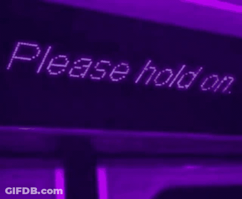 Two Hello Kitty Necklaces On Purple Background GIF