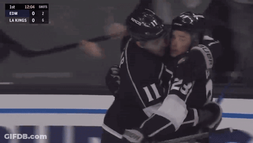 Two Hockey Players Hugging During LA Kings Vs Edmonton Game GIF