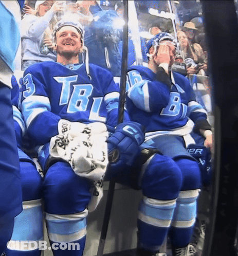 Two Hockey Players In Blue TBL Uniforms GIF