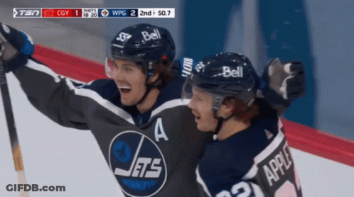 Two Hockey Players In Jets Jerseys Celebrating On Ice GIF