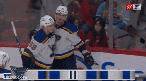 Two Hockey Players One With Number 8 GIF